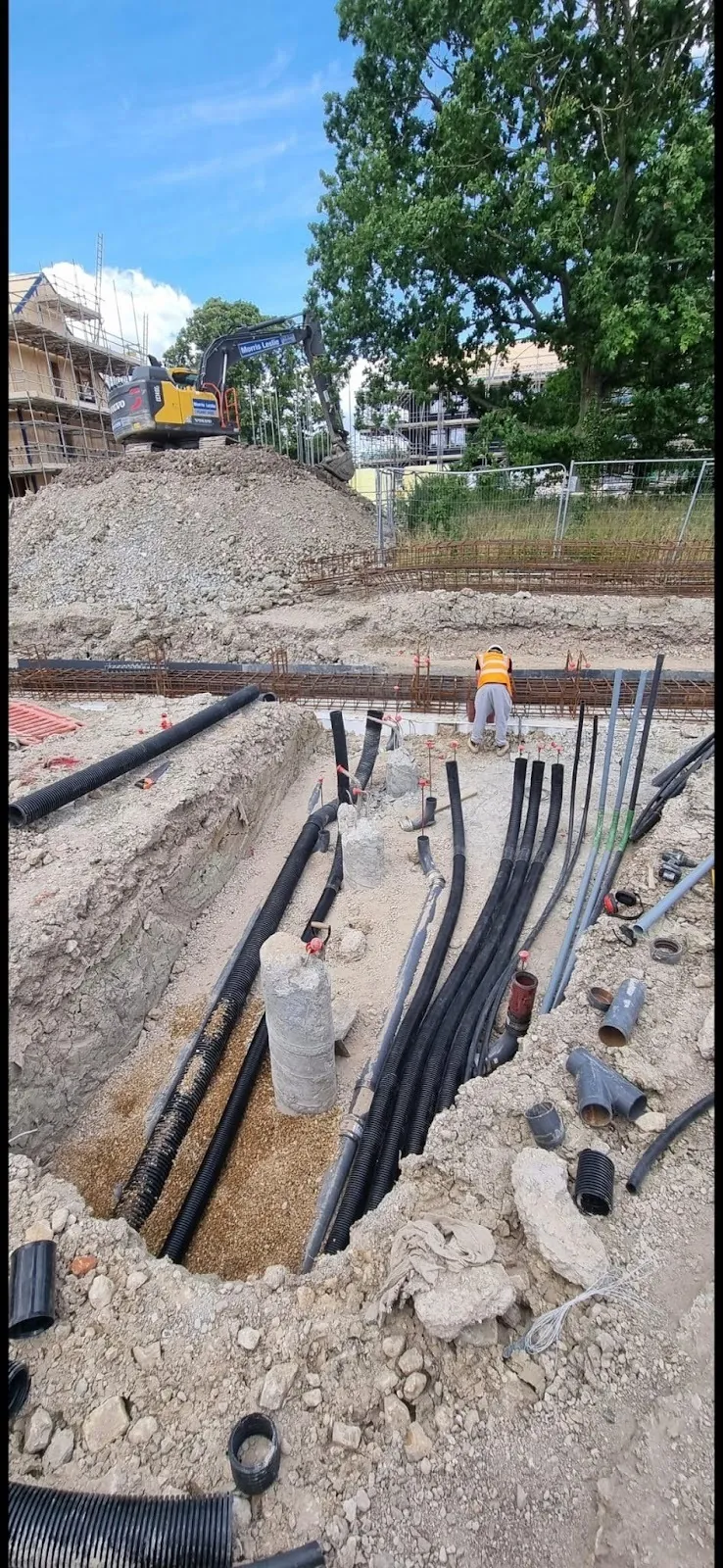 Service ducts laid in a trench on a building site